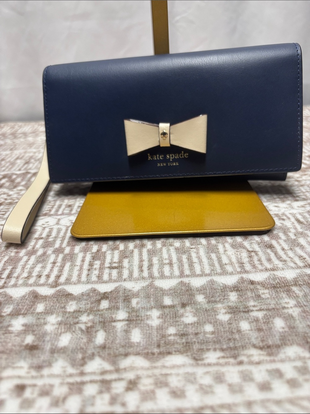 kate spade Baldwin Street Linney Navy Leather Wristlet with Cream Bow Accent